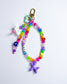 Charm Perrito Morado