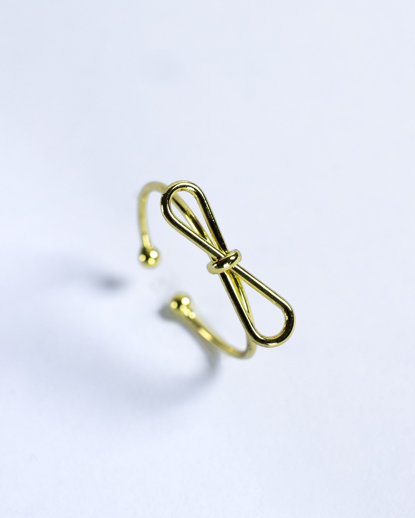 Anillo Ajustable Lazo Dorado